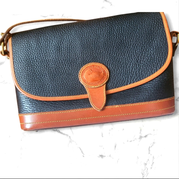 Dooney & Bourke Handbags - Dooney & Bourke Vintage  "Duck" Black and Tan Shoulder Bag